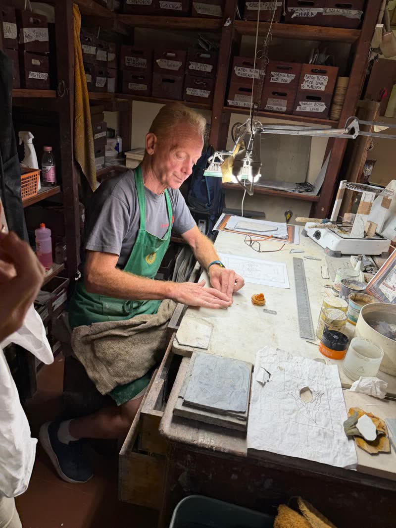 An artisan at work in a traditional Florentine workshop