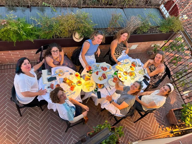 A shared meal on a roof terrace in Florence